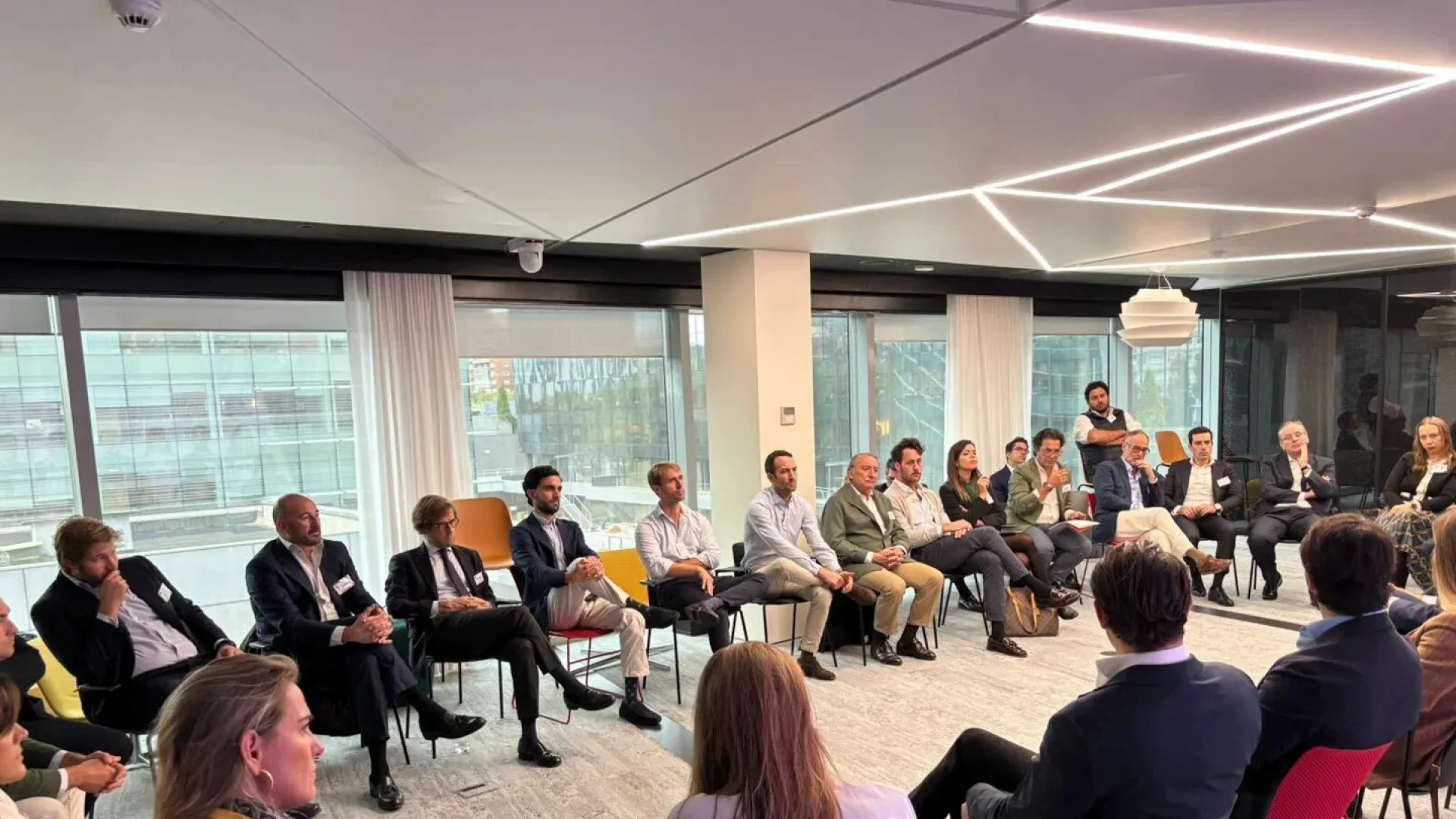 Senior executives attending a GRI Institute real estate panel discussion on value-add opportunities in the Spanish market.